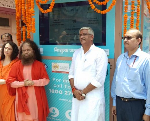 Ribbon-cutting ceremony marking the inauguration of a Pi-lo Smart Water ATM at a public location.