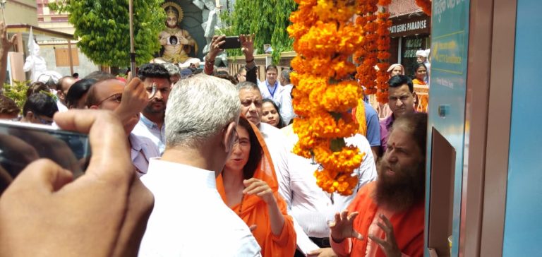 Ribbon-cutting ceremony marking the inauguration of a Pi-lo Smart Water ATM at a public location.