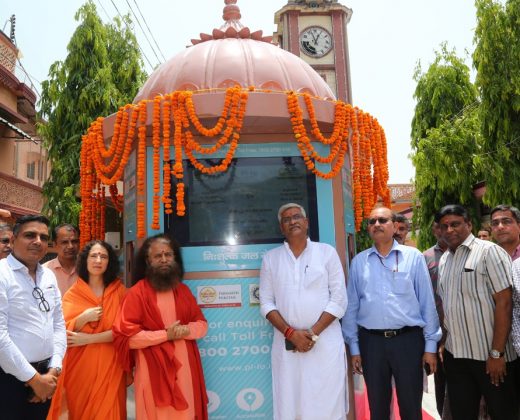 Ribbon-cutting ceremony marking the inauguration of a Pi-lo Smart Water ATM at a public location.
